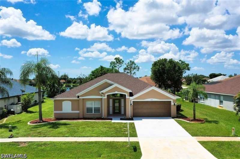 3 bedroom SingleFamilyResidence at 4601 Varsity Cir, Varsity Lakes, Lehigh Acres — photo 1