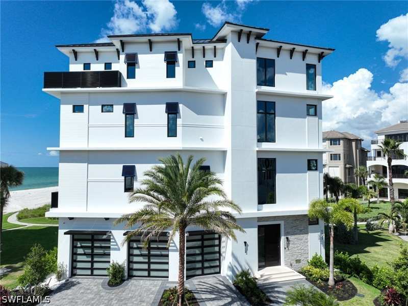 6 bedroom SingleFamilyResidence at 105 Saint Eustacius Ln, Barefoot Beach, Bonita Springs — photo 1