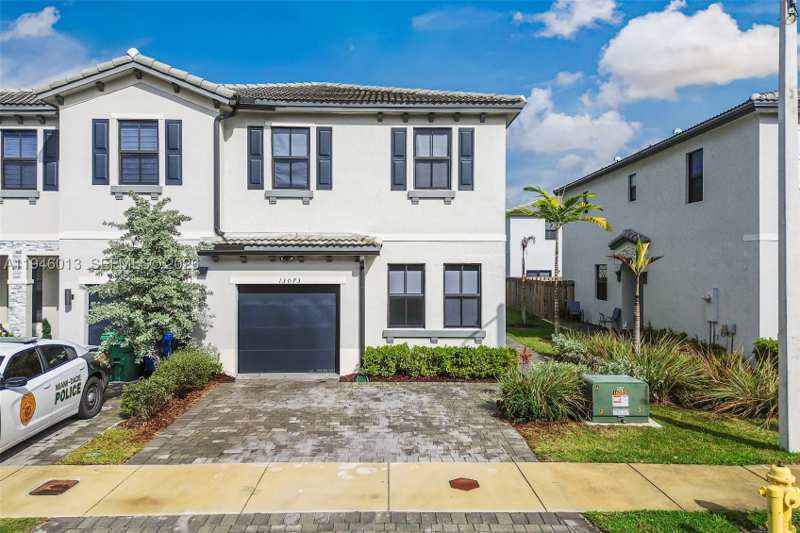 4 bedroom Townhouse at 13073 SW 286th Way, Cambridge Estates First A, Homestead — photo 1