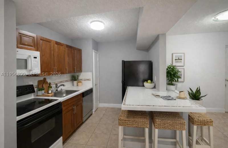 2 bedroom Townhouse at 850 SW 129th Pl 103, University Trail Condo, Miami — photo 1