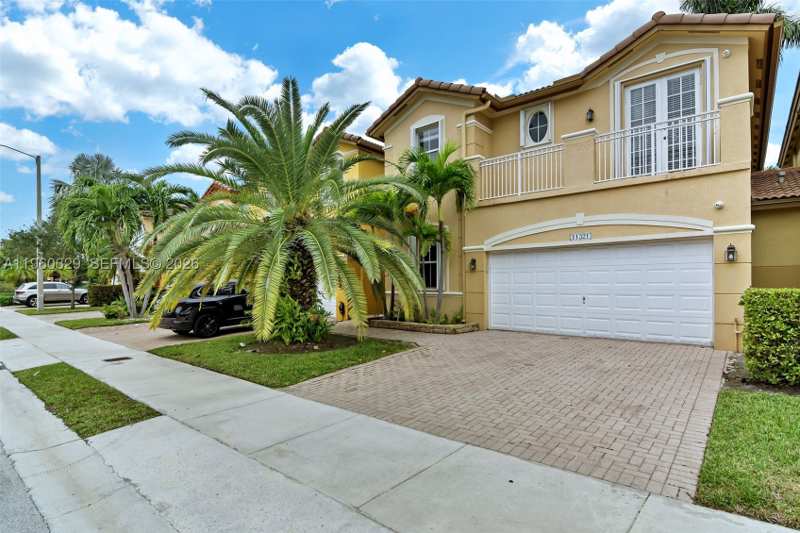 5 bedroom SingleFamilyResidence at 11321 NW 84th St, Islands At Doral Northwest, Doral — photo 1