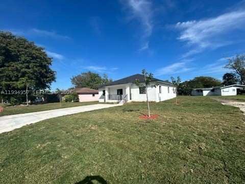 4 bedroom SingleFamilyResidence at 1468 NW 100th St, Miami Park Sec 1, Miami — photo 1