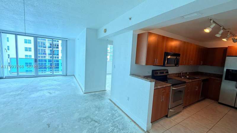 1 bedroom Condominium at 7501 E Treasure Dr 8B, Treasures On The Bay II C, North Bay Village — photo 1