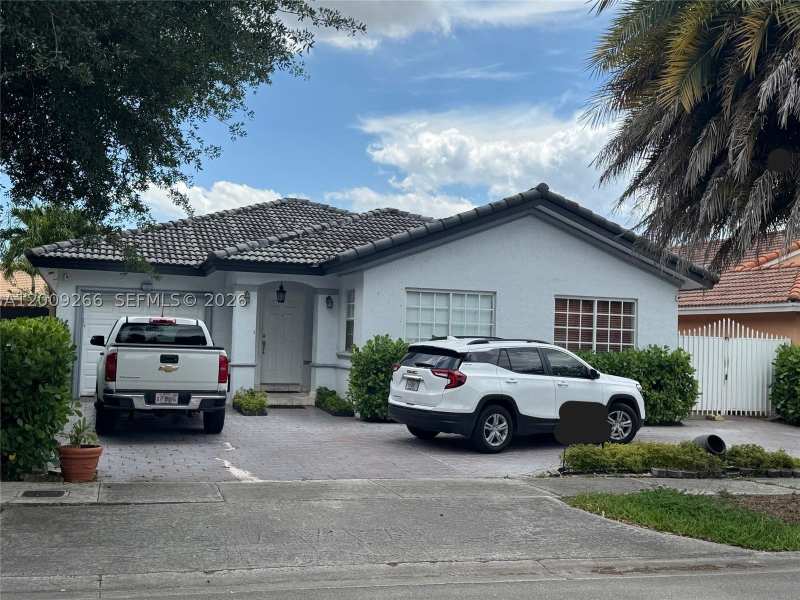 4 bedroom SingleFamilyResidence at 8748 NW 143rd Ter, Serenity Point, Miami Lakes — photo 1