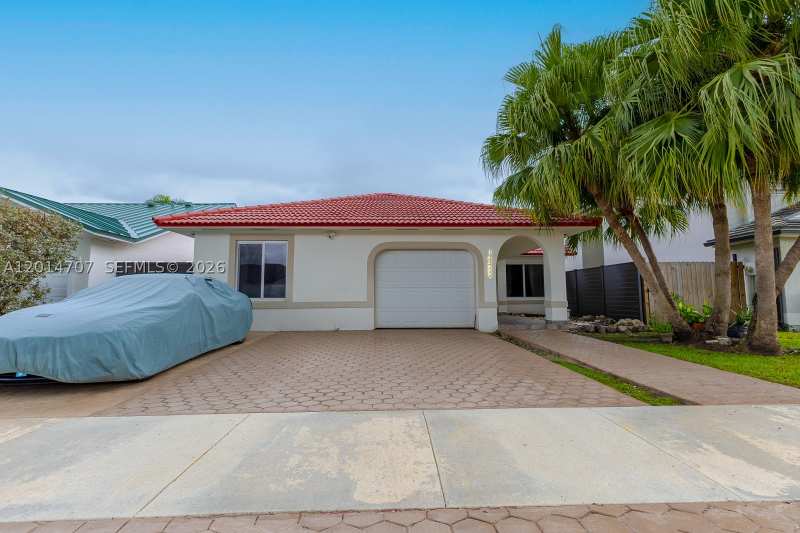 4 bedroom SingleFamilyResidence at 14452 SW 115th St, California Hills, Miami — photo 1