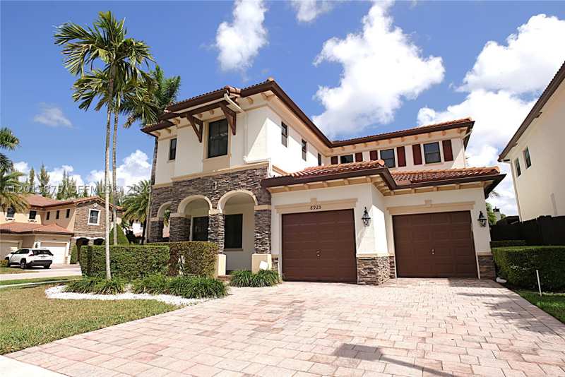 4 bedroom SingleFamilyResidence at 8925 NW 99th Ave, Grand Bay, Doral — photo 1