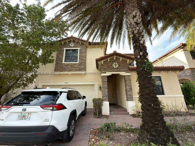 5 bedroom SingleFamilyResidence at 9845 NW 86th Ter, Doral Breeze, Doral — photo 1