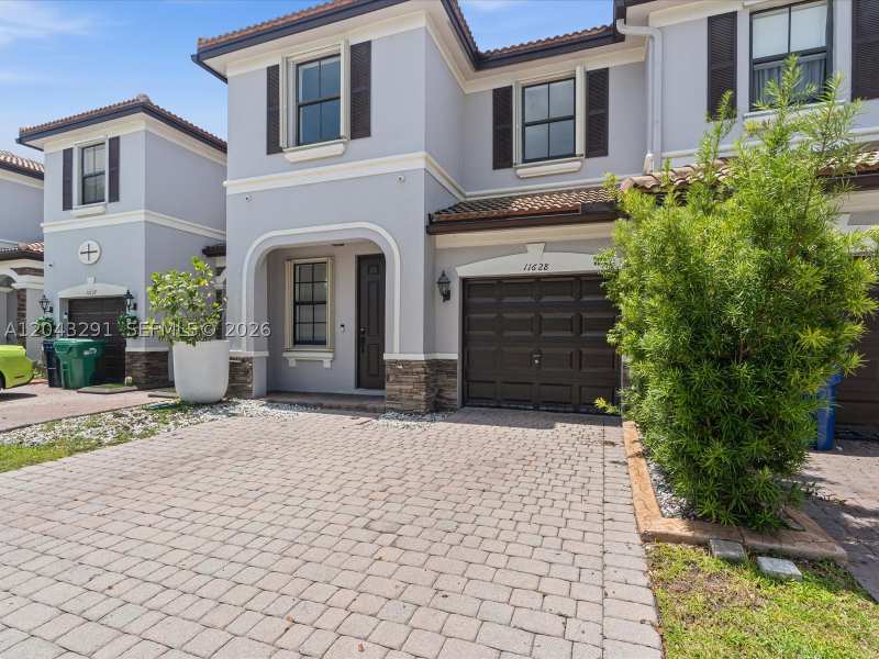 4 bedroom Townhouse at 11628 NW 87th Ln 11628, St Moritz Estates, Doral — photo 1