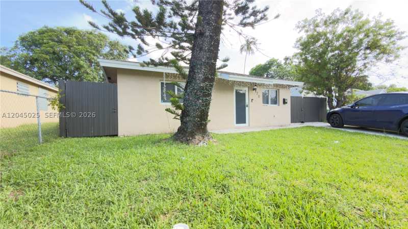 4 bedroom SingleFamilyResidence at 920 NW 65th St, Seventh Ave Park, Miami — photo 1