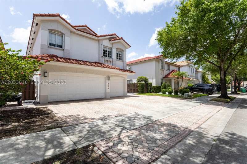 5 bedroom SingleFamilyResidence at 10873 NW 71st St, Doral Isles St Croix, Doral — photo 1