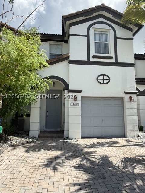 4 bedroom Townhouse at 11419 NW 76th Ter, Doral Isles North Sec Two, Doral — photo 1