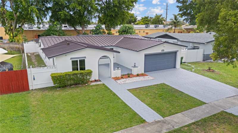 4 bedroom SingleFamilyResidence at 9110 NW 18th Ct, University Heights, Pembroke Pines — photo 1
