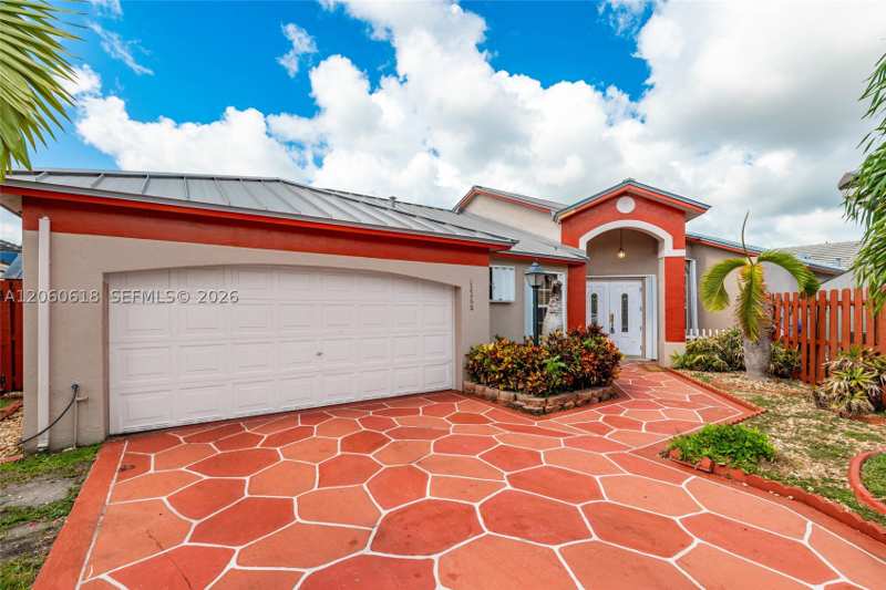 4 bedroom SingleFamilyResidence at 12268 SW 144th Ter, Woods Lake, Miami — photo 1