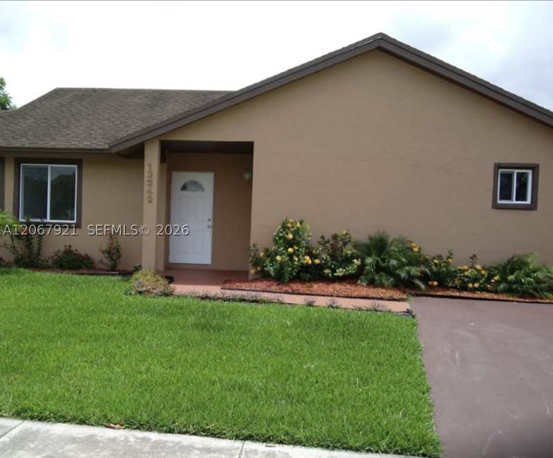 4 bedroom SingleFamilyResidence at 12242 SW 210th St, Oak Park Sec 5, Miami — photo 1