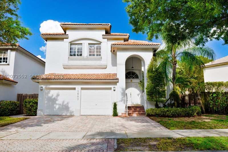 4 bedroom SingleFamilyResidence at 10853 NW 71st St, Doral Isles St Croix, Doral — photo 1