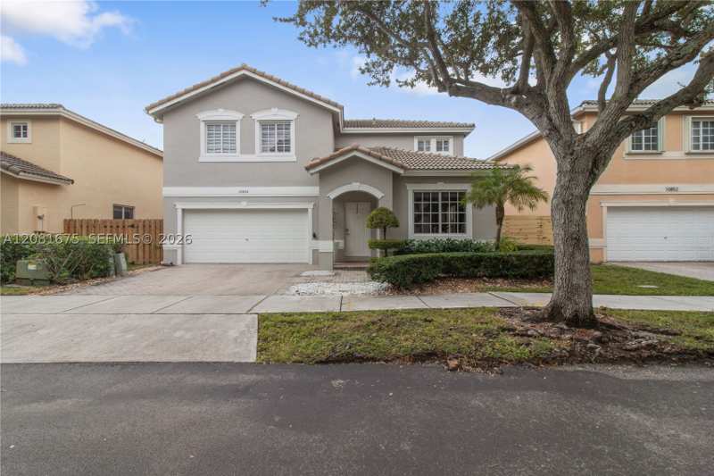 3 bedroom SingleFamilyResidence at 10842 NW 53rd Ln, Doral Reserve, Doral — photo 1