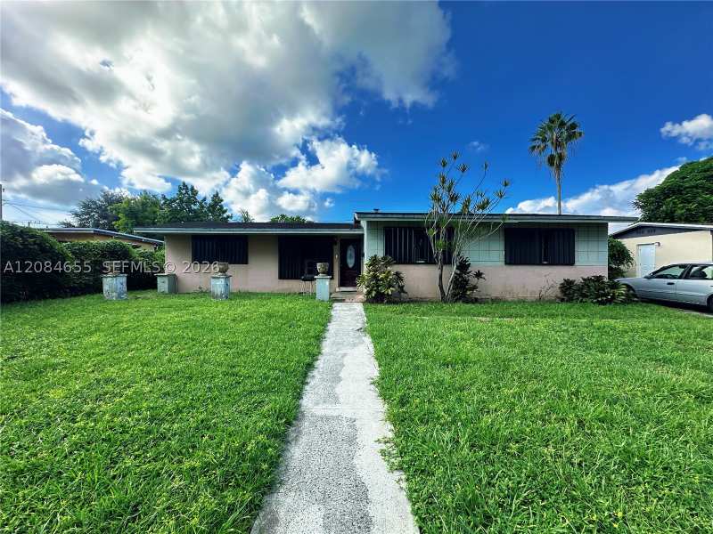 3 bedroom SingleFamilyResidence at 1410 NW 174th St, Scott Lake Manor Sec 7, Miami Gardens — photo 1