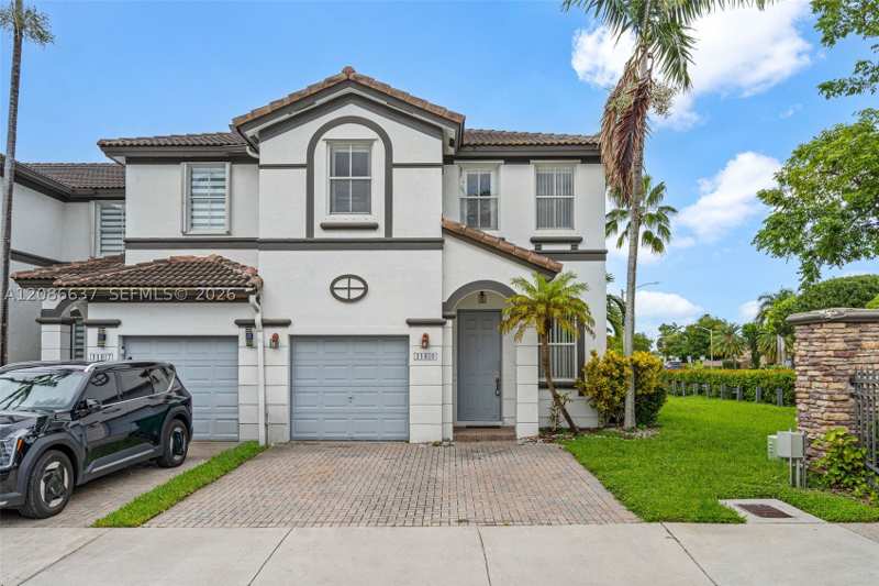 4 bedroom Townhouse at 11401 NW 76th Ter, Doral Isles North Sec Two, Doral — photo 1