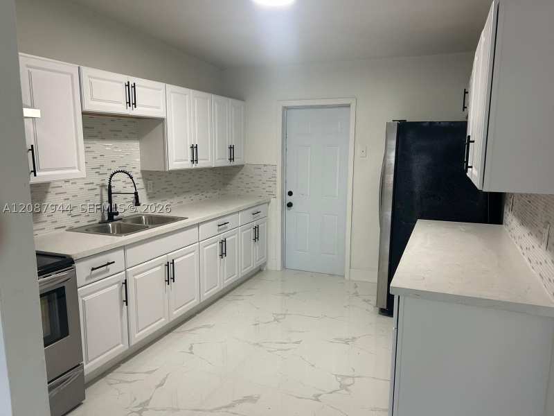 4 bedroom SingleFamilyResidence at 3070 NW 97th St, The Tropics Amd, Miami — photo 1