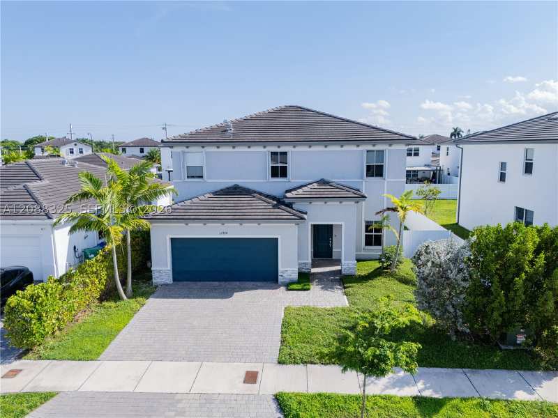 5 bedroom SingleFamilyResidence at 12740 SW 214th Ter, Siena North, Miami — photo 1