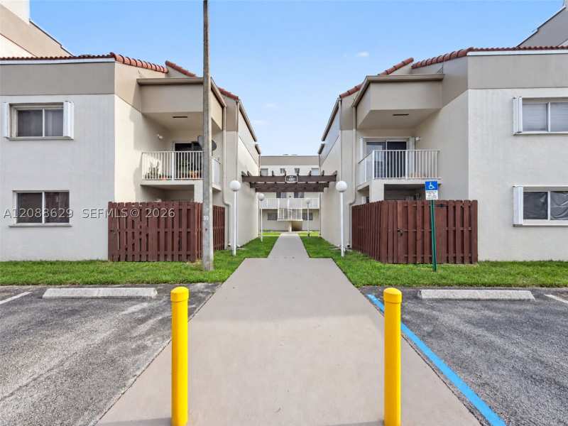 2 bedroom StockCooperative at 14901 SW 80th St 115, The Seasons Villas & Thms, Miami — photo 1
