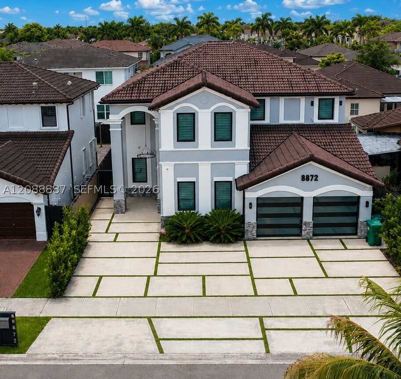 4 bedroom SingleFamilyResidence at 8872 NW 181st St, Century Gardens, Hialeah Gardens — photo 1