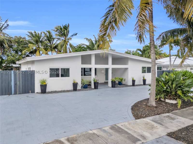4 bedroom SingleFamilyResidence at 2325 NE 194th St, Enchanted Lake Sec 6, Miami — photo 1