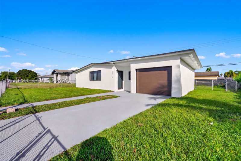 4 bedroom SingleFamilyResidence at 10945 SW 218th Ter, Lincoln City Sec A, Miami — photo 1