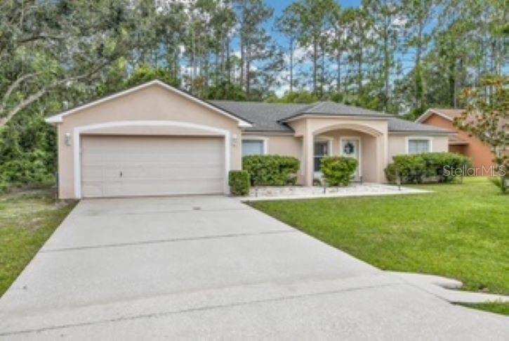 4 bedroom Single Family Residence at 27 Patric Drive, Southwest Quadrant Ph 01-04, Palm Coast — photo 1