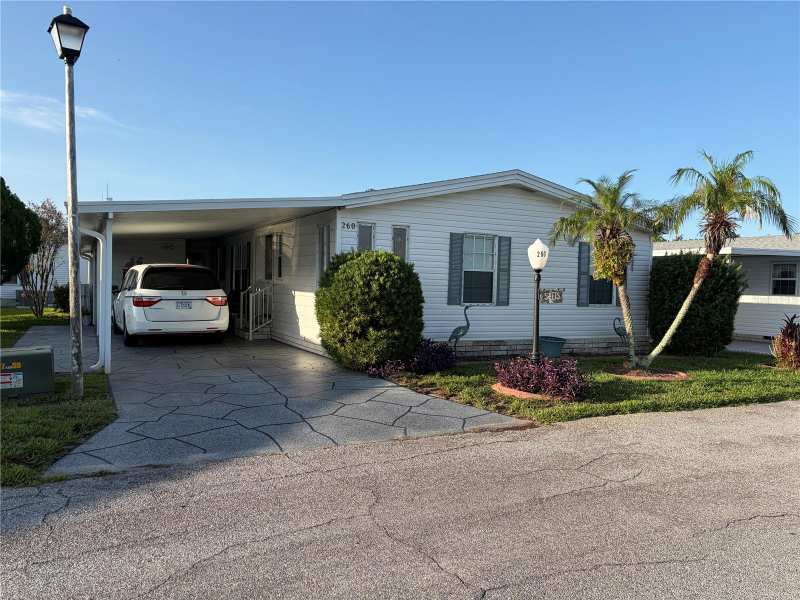 2 bedroom Manufactured Home at 260 Ramsgate Way, Sweetwater Golf & Tennis Club, Haines City — photo 1