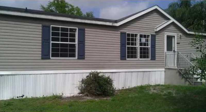3 bedroom Manufactured Home at 7655 NE 8th Drive, Cedar Cove II, Okeechobee — photo 1
