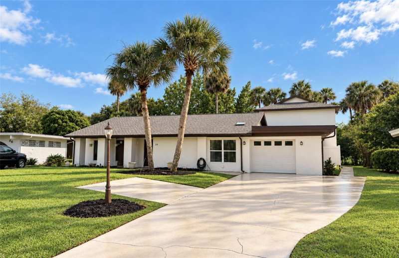 4 bedroom Single Family Residence at 24 Cooper Lane, Lake Forest & Lake Forest North, Palm Coast — photo 1