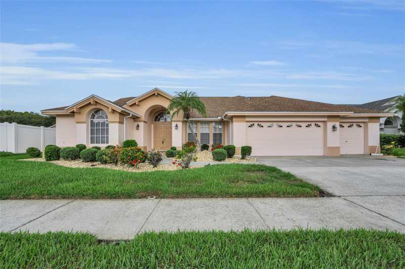 4 bedroom Single Family Residence at 7405 Evesborough Lane, Wyndtree, New Port Richey — photo 1