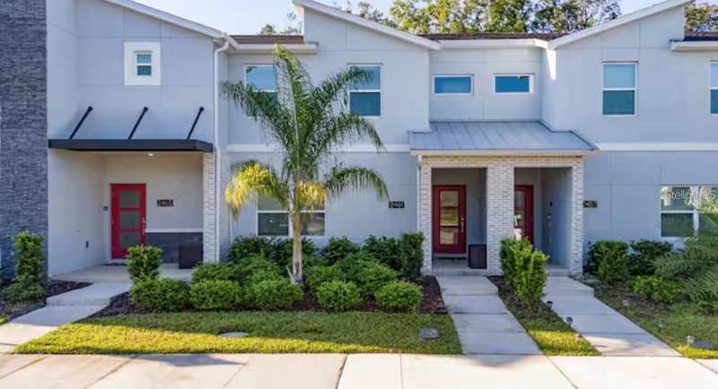4 bedroom Townhouse at 2461 Reading Trail, Cove At Storey Lake 5, Kissimmee — photo 1