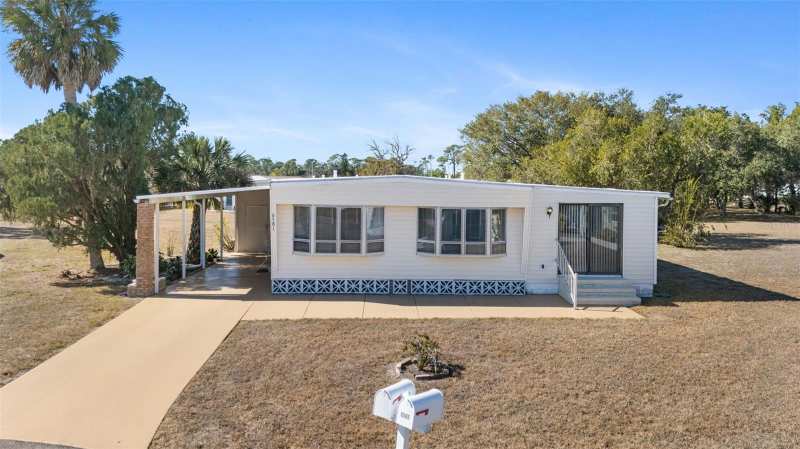 3 bedroom Mobile Home at 6581 Honu Court, Holiday Park, North Port — photo 1