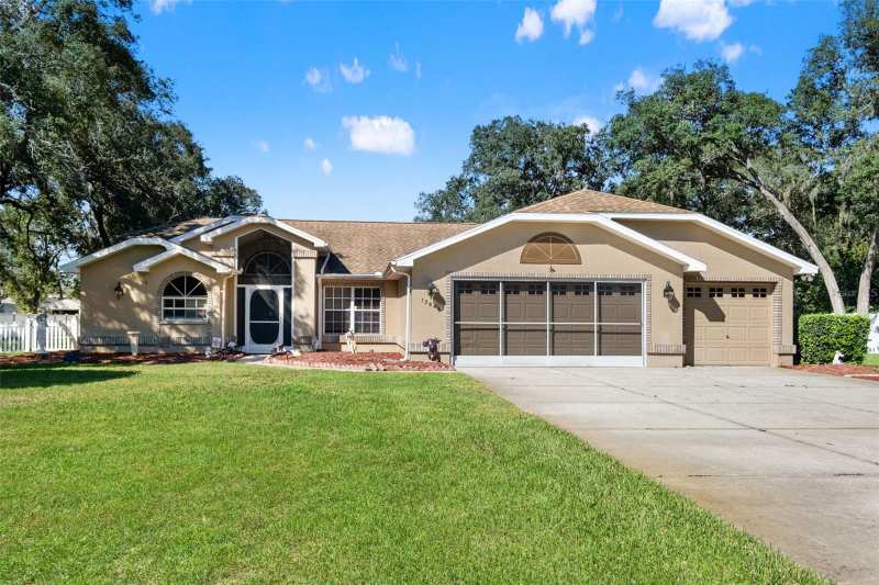 3 bedroom Single Family Residence at 12843 Oak Nut Street, Rolling Oaks Estates, Hudson — photo 1