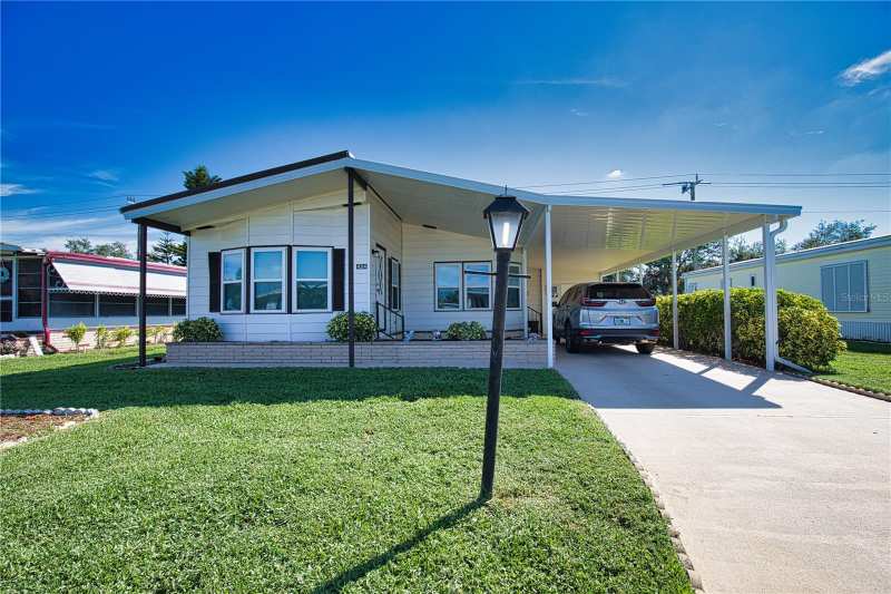 2 bedroom Manufactured Home at 424 Tarde Logo Circle, La Casa Mhp Co-Op, North Port — photo 1