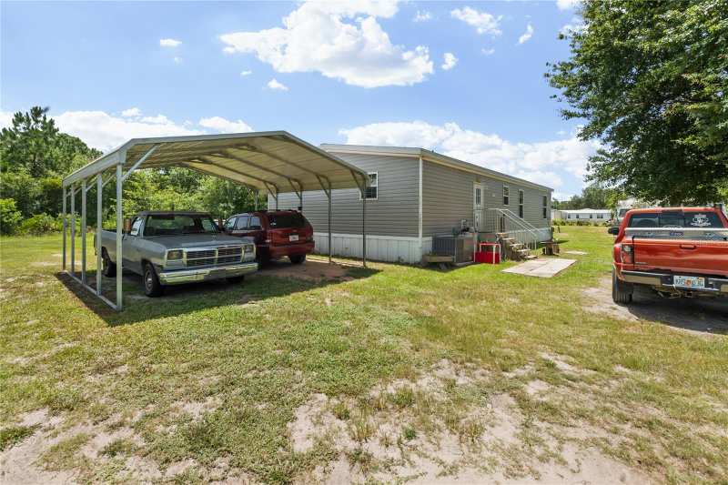 3 bedroom Mobile Home at 1833 E Sunnyside Drive, Holiday Lake Estate, Lorida — photo 1