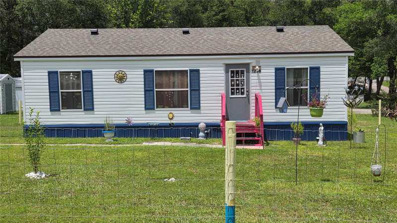 3 bedroom Manufactured Home at 1298 NE Boros Drive, Williston Highlnads Golf & C Club Estate, Williston — photo 1