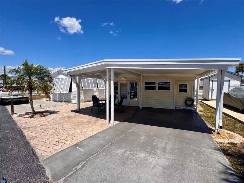 2 bedroom Manufactured Home at 1475 Flamingo Drive #128, Holiday Travel Park Englewood, Englewood — photo 1