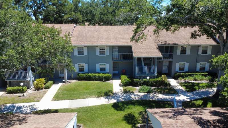 2 bedroom Condominium at 1420 Oak Hill Drive #102, Lake Tiffany Condo, Dunedin — photo 1