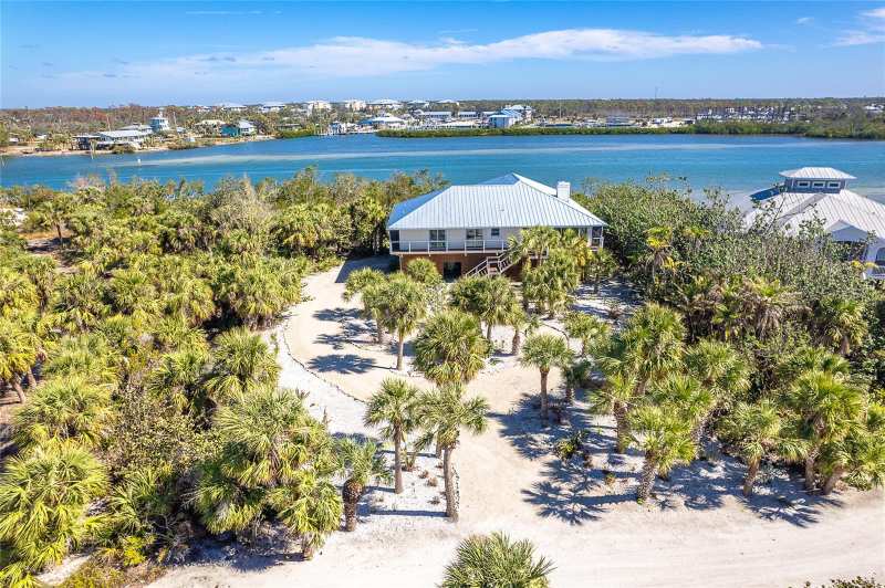 3 bedroom Single Family Residence at 5 Pointe Way, Pointe Bocilla Land Condo, Placida — photo 1