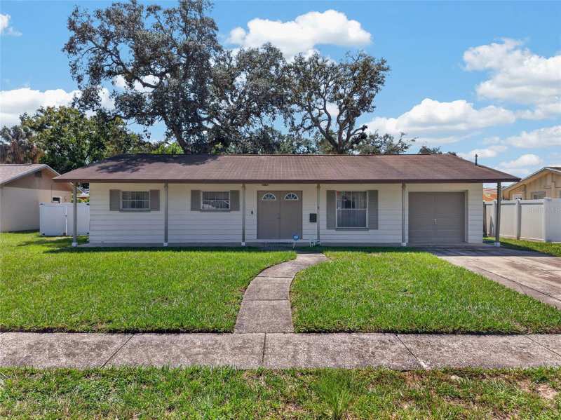 3 bedroom Single Family Residence at 3312 W Burke Street, Idle Grove Park Unit 1 Corr, Tampa — photo 1