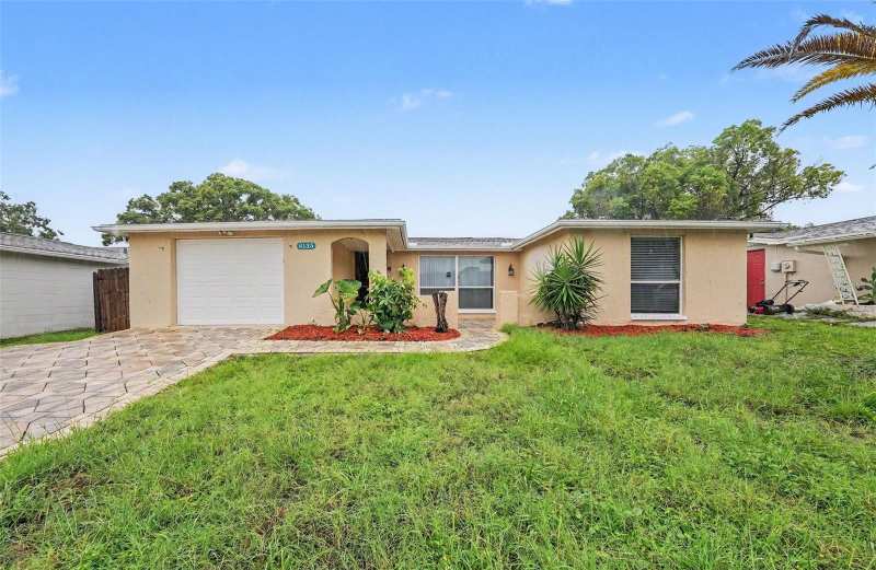 3 bedroom Single Family Residence at 9135 Hunt Club Lane, Regency Park, Port Richey — photo 1