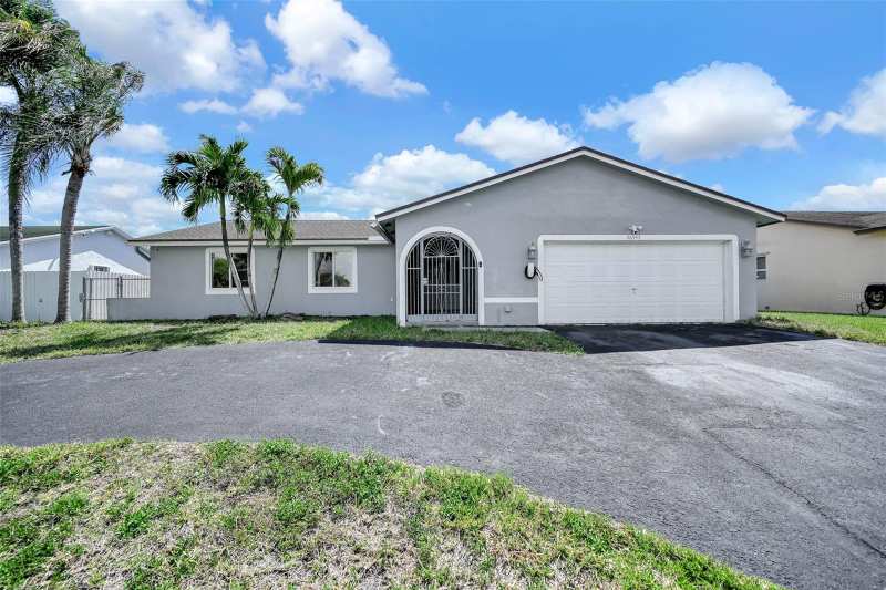 4 bedroom Single Family Residence at 26543 SW 122nd Place, Meadow Wood Manor Sec 10, Homestead — photo 1