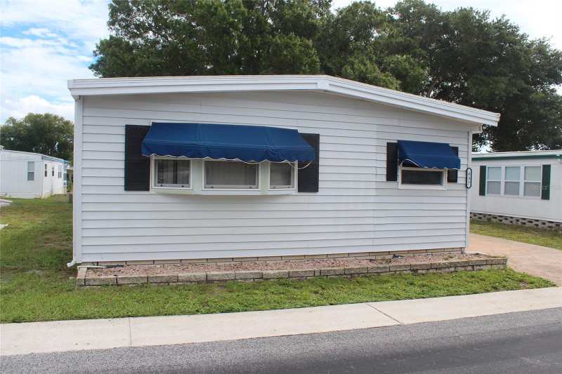 2 bedroom Manufactured Home at 837 Cane Palm Street, Largo, Largo — photo 1