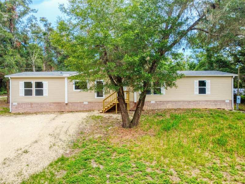 4 bedroom Manufactured Home at 12841 SE 103rd Terrace, Lake Weir Heights, Belleview — photo 1