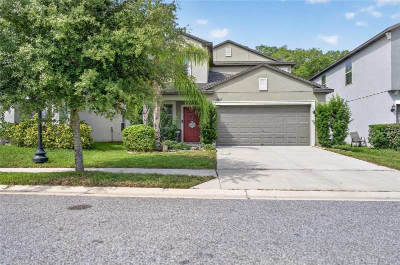 5 bedroom Single Family Residence at 13322 Marble Sands Court, Lakeside Ph 4, Hudson — photo 1