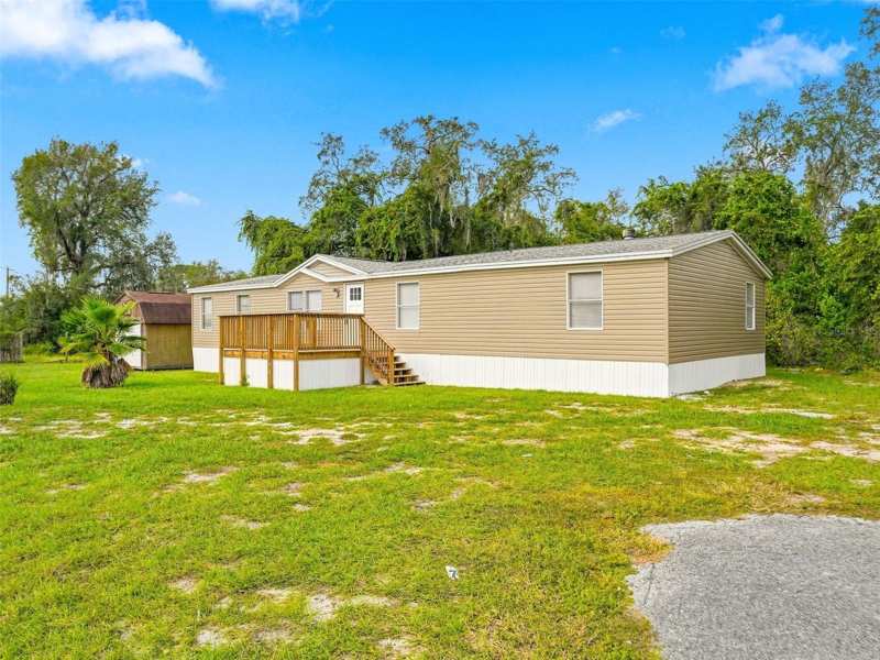 4 bedroom Manufactured Home at 10043 Gilmer Street, Moon Lake Estates, New Port Richey — photo 1