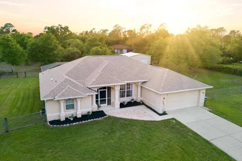 4 bedroom Single Family Residence at 2105 Bennett Lane, Port Charlotte Sub 24, North Port — photo 1